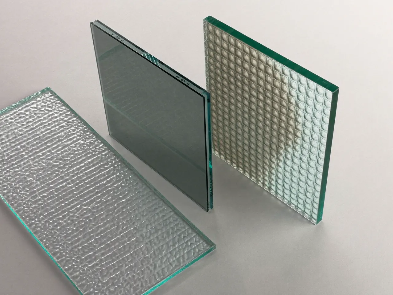 Samples of toughened, obscure and laminated double glazing glass units